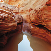 Happy Canyon fantastic scene. Unusual colorful sandstone formations in deserts of Utah are popular destination for hikers.